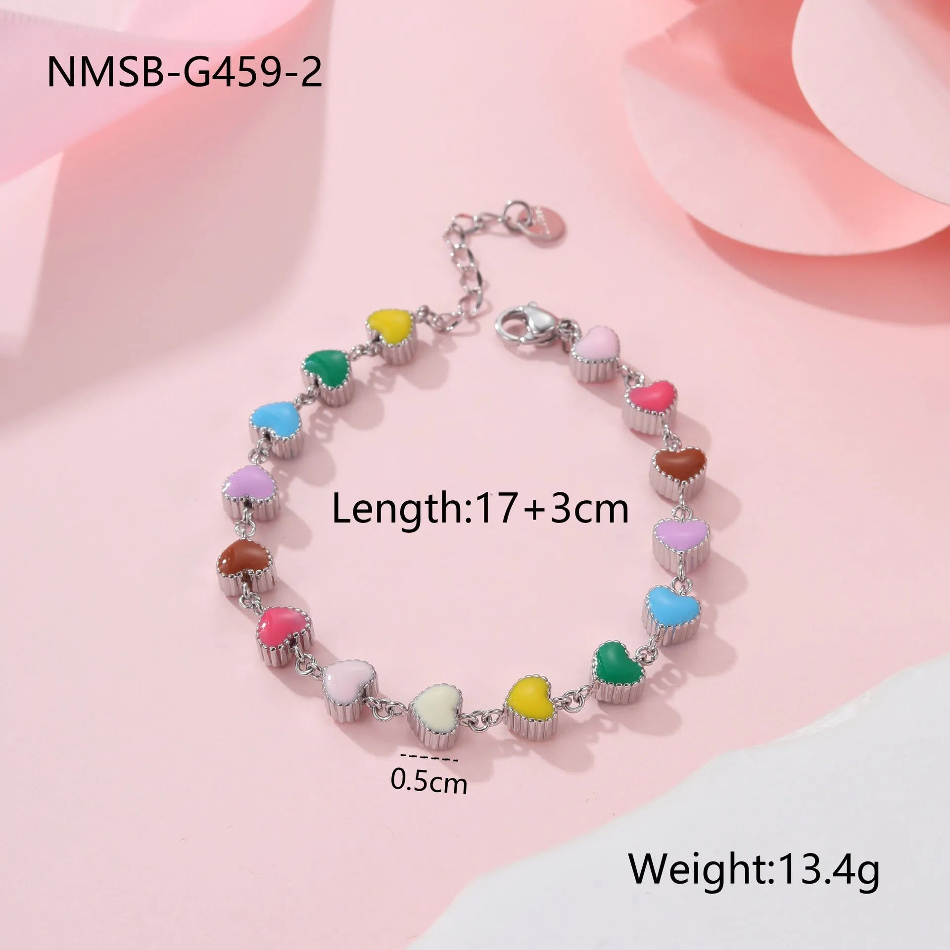 Close-up of a women's love heart-shaped bracelet in stainless steel with 18K gold plating.