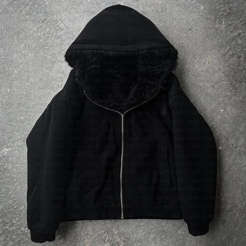 A black casual loose coat with long sleeves on a hanger, cardigan style.