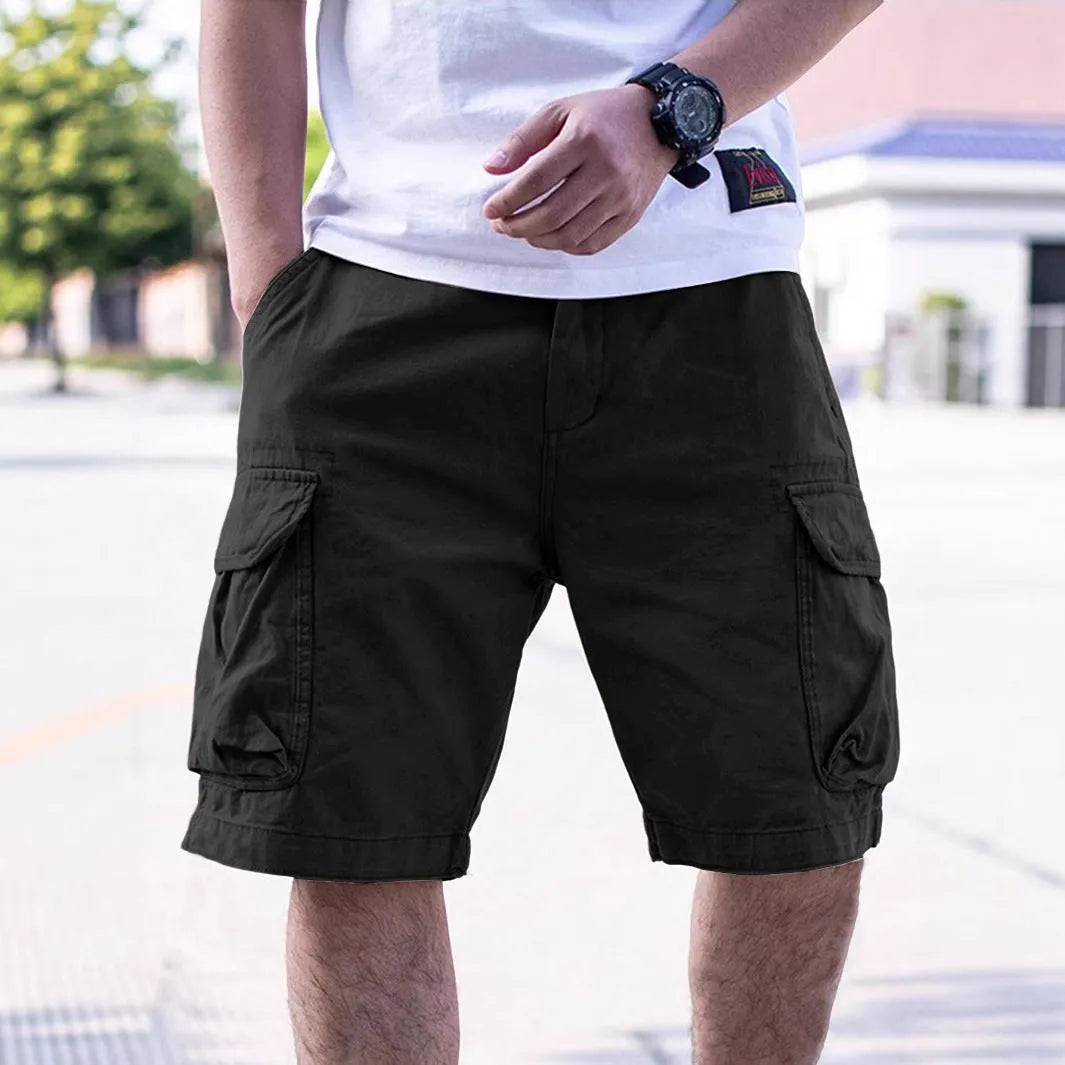 Men's loose-fitting cotton blend shorts in army green with a retro workwear style.