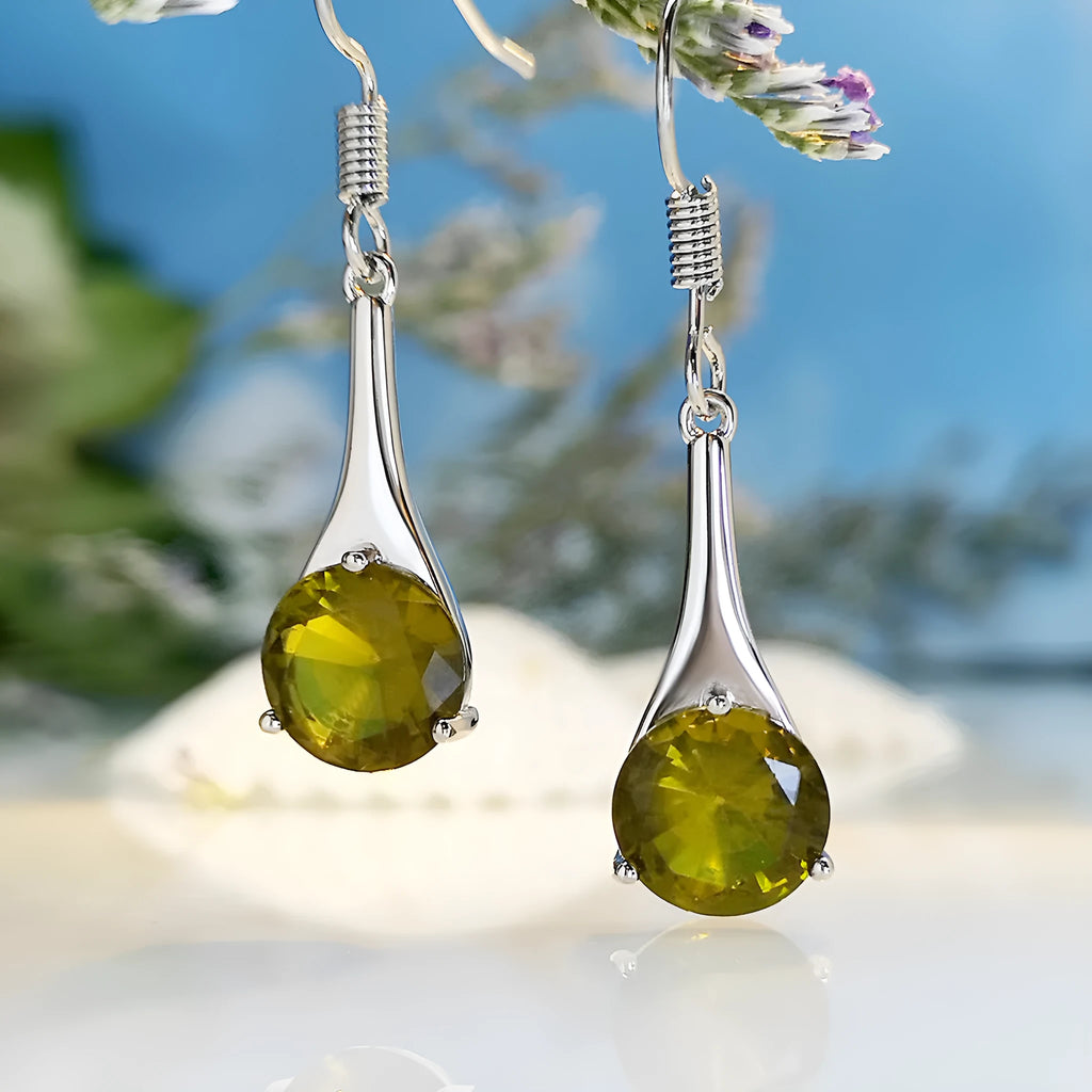 Olive green topaz earrings with water drop shape and electroplated alloy construction