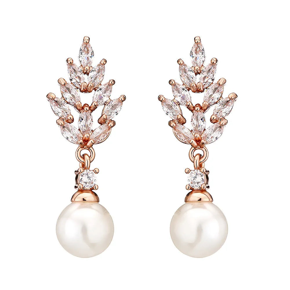 Geometric flower earrings with micro inlaid zircon and pearl detailing in gold plating