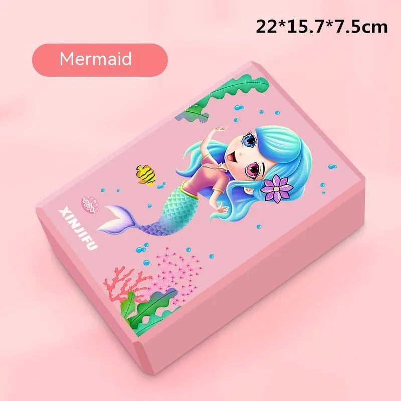 High-density EVA yoga block in pink next to a dark blue block, showing 7.5cm height and printed cartoon design options.