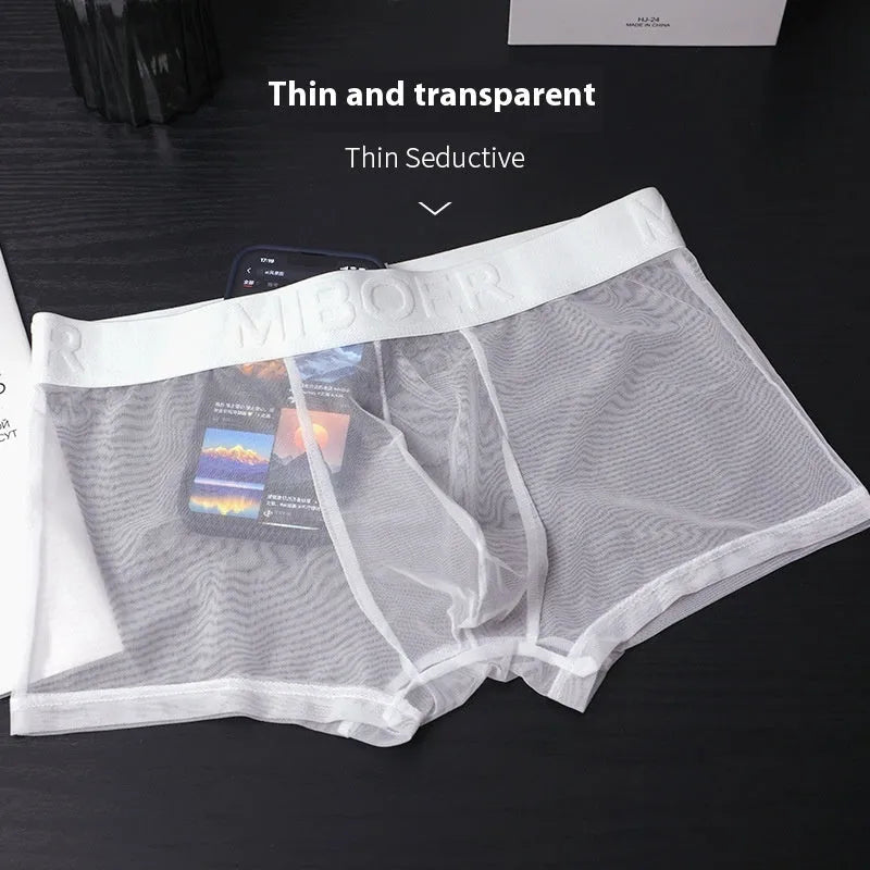 Men's thin solid colour boxer shorts in quick-dry polyester fabric on a size chart.