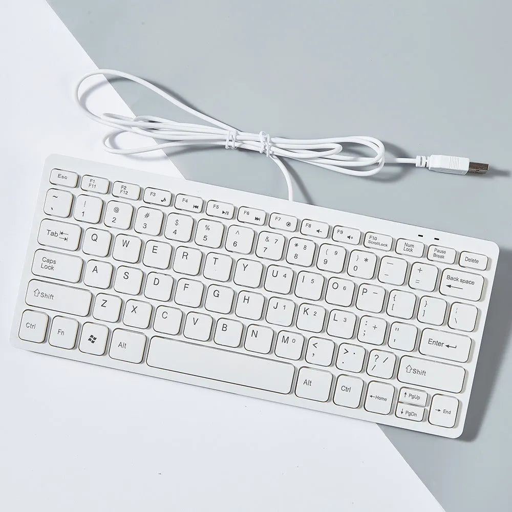 USB wired mini keyboard in black with compact 280mm width and noiseless keys for laptop use