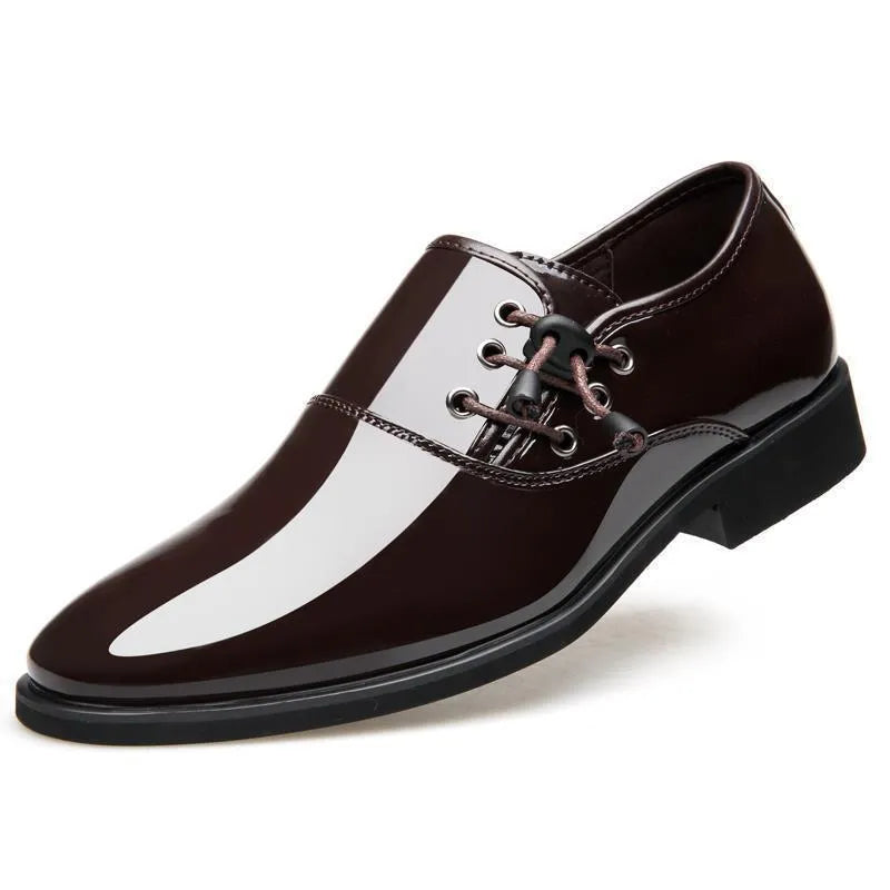 Men's black and brown formal business shoes with round toe and square heel on a rubber sole.