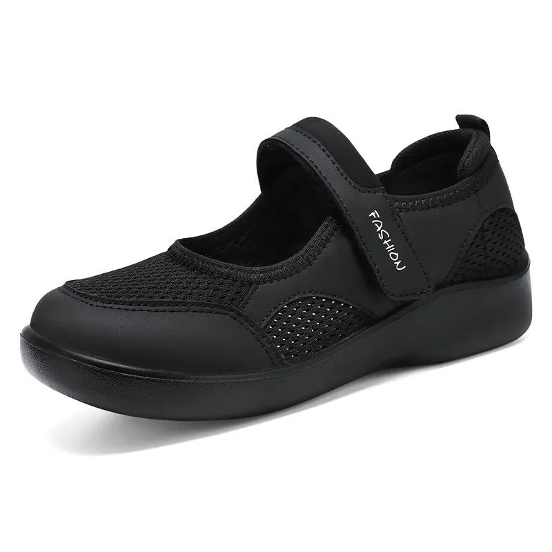 Women's grey mesh casual shoes with velcro fastening and round toe design