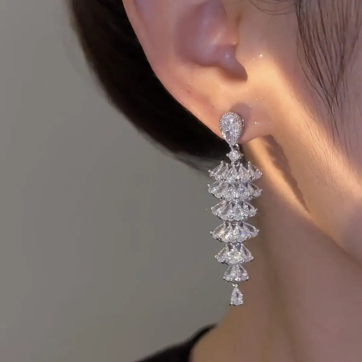 Silver pagoda Christmas tree drop earrings with sparkling zircon stones and copper construction