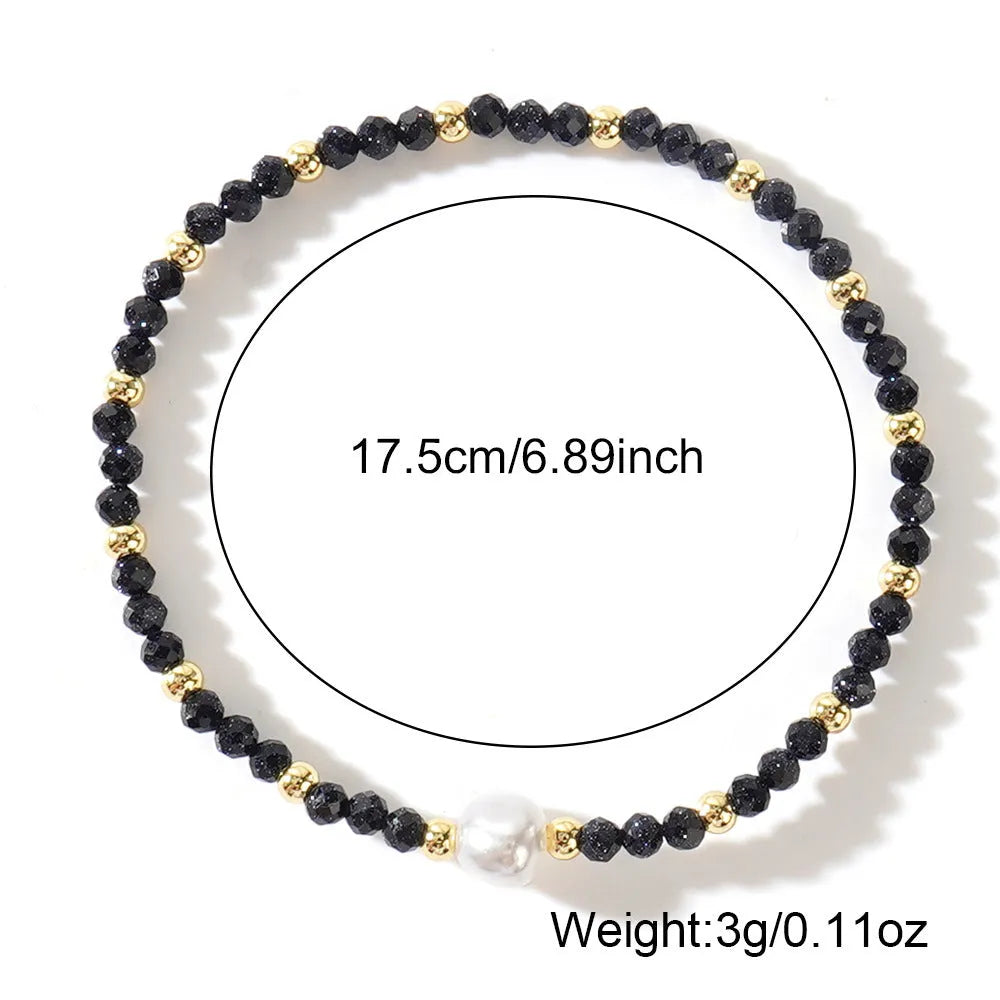 A geometric natural stone bracelet with an ellipse detail, shown in one of fifteen available colour options.