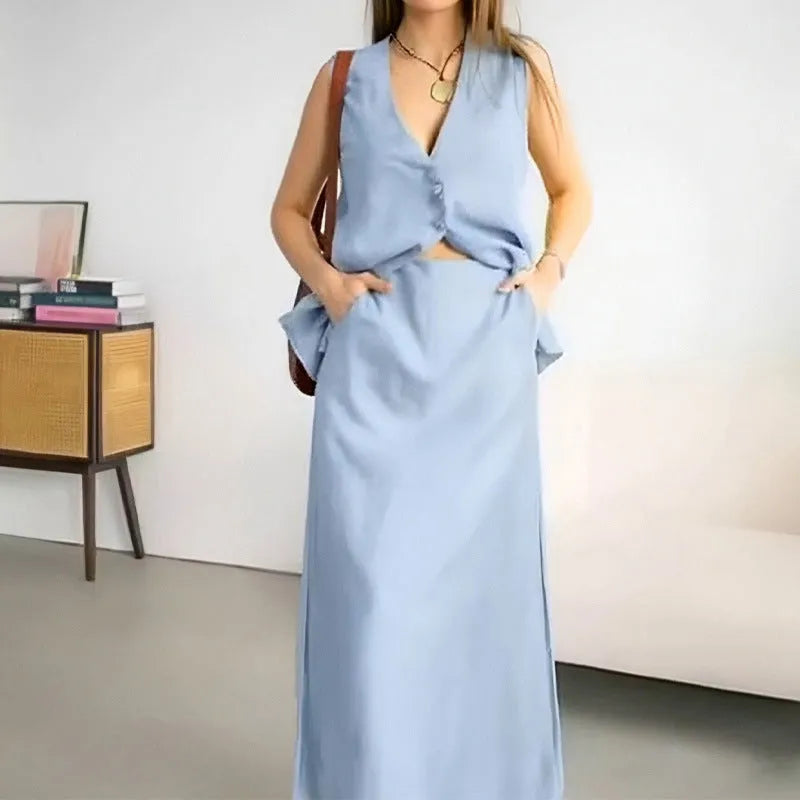 Blue polyester sleeveless vest and long skirt two-piece casual outfit on mannequin