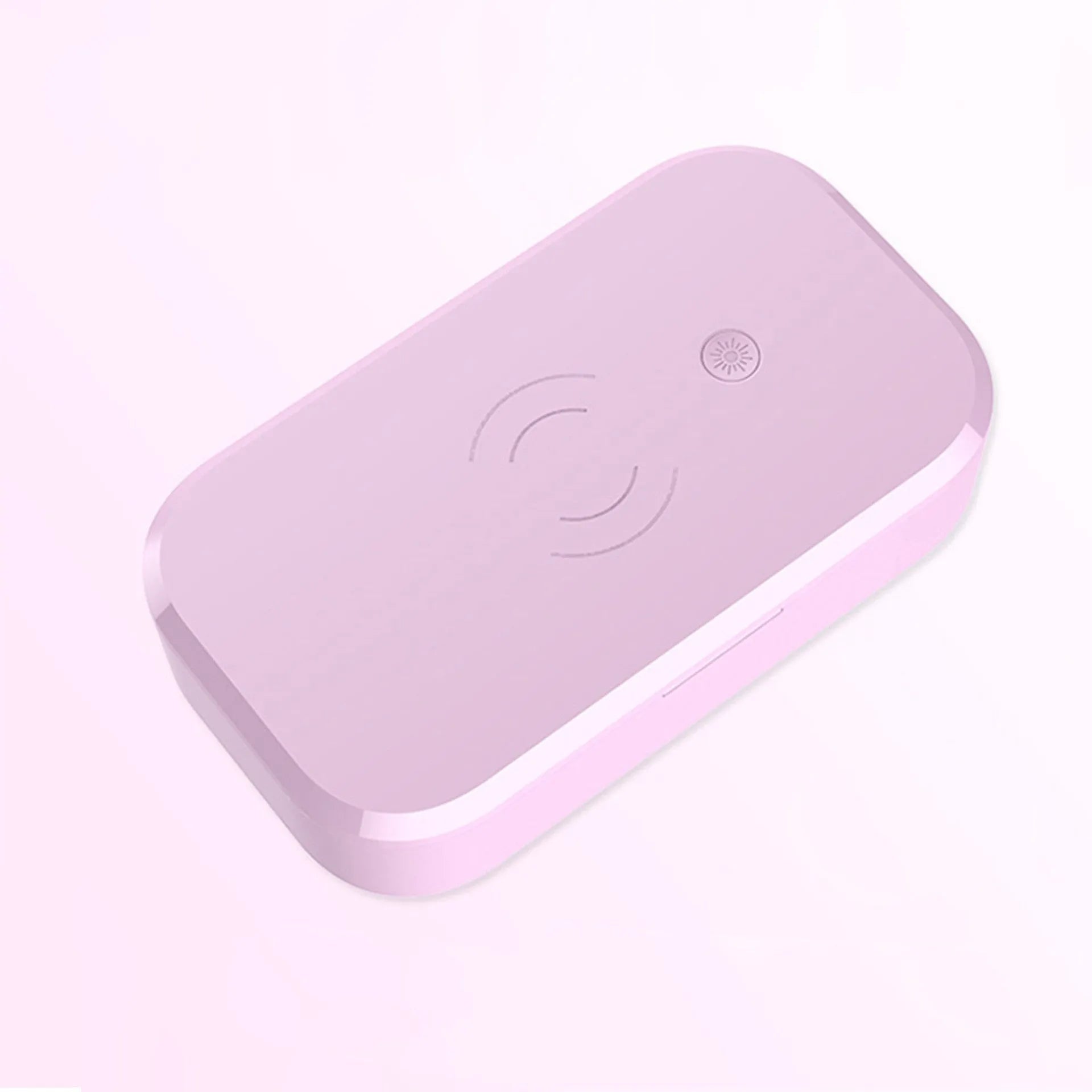 Compact white ultraviolet disinfection box with wireless charging surface for mobile phones