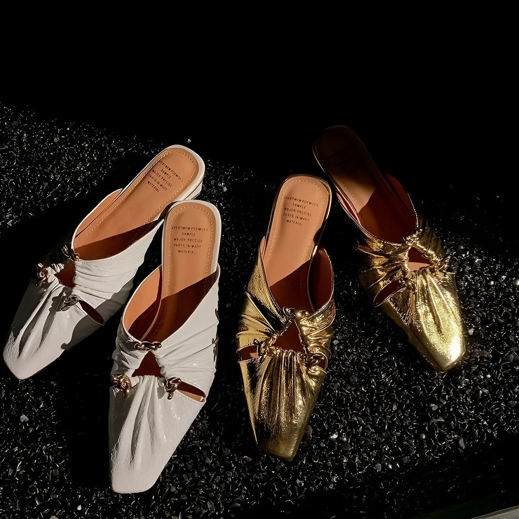 Women's genuine leather half toe cap slippers in silver with square toe and low TPR sole.