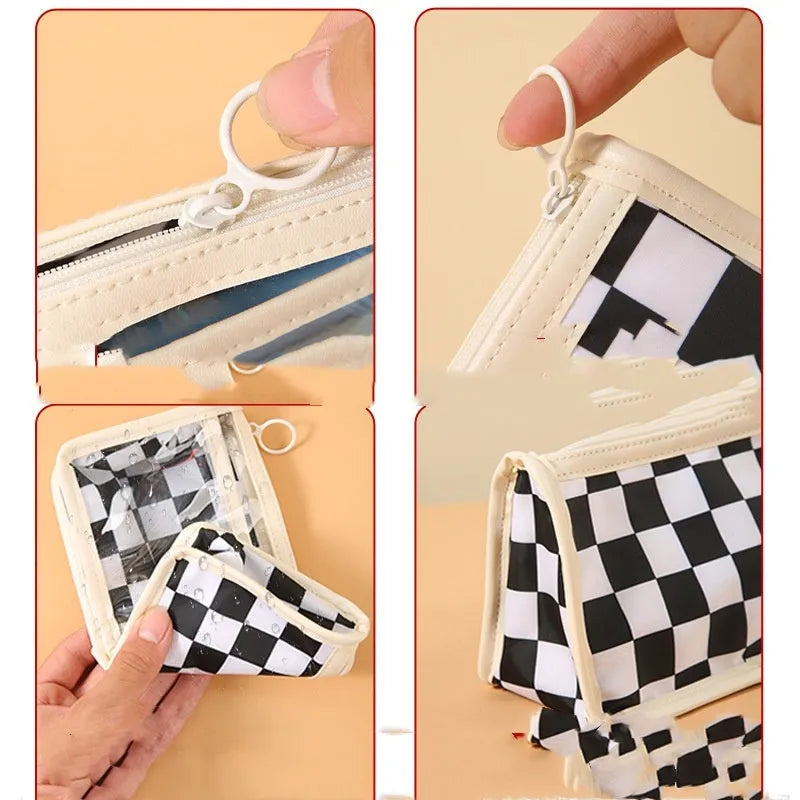 Transparent PVC pencil case with chessboard pattern showing pens inside, black and white grid design