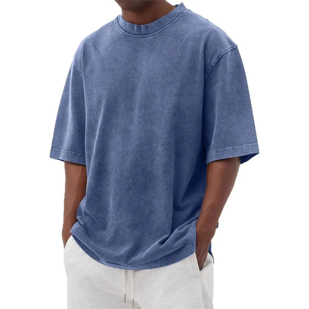 Men's distressed stone wash pullover T-shirt in loose fit with half sleeves available in multiple solid colours