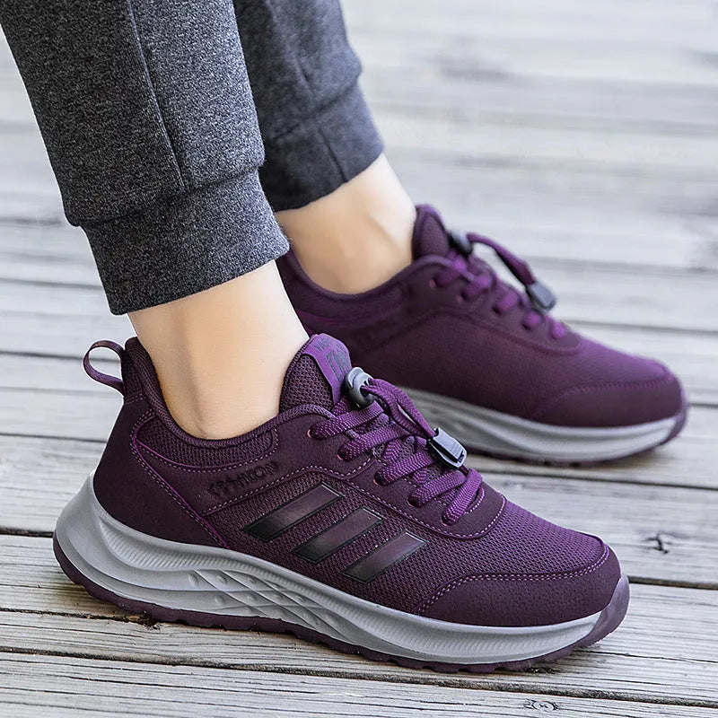 Men's and women's elastic band slip-on casual shoes in mesh material, showing colour options.