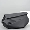 Grey PU leather men's crossbody bag showing internal phone and document compartments