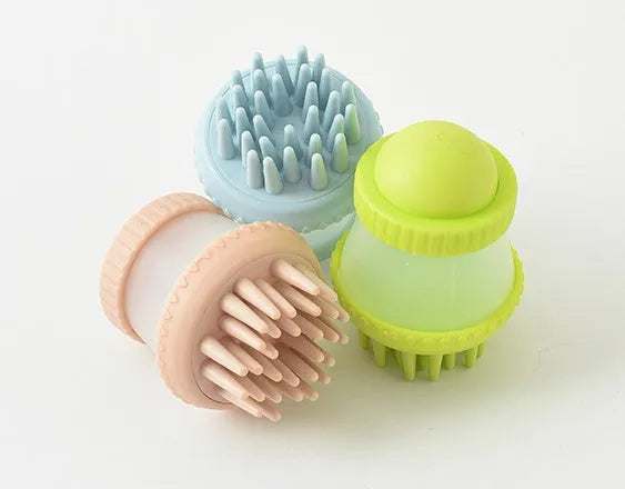 Multifunctional TPR pet bathing brush in pink, 11.8x7.8cm, with silicone bristles for dog and cat grooming
