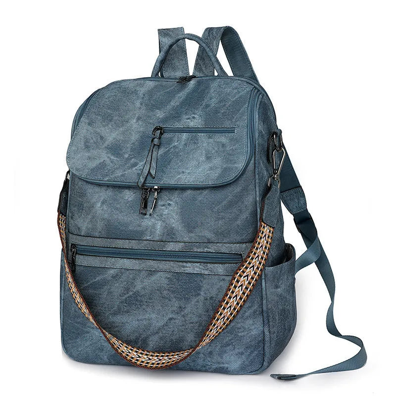 Retro college student backpack in PU leather with curved shoulder straps showing stitching detail