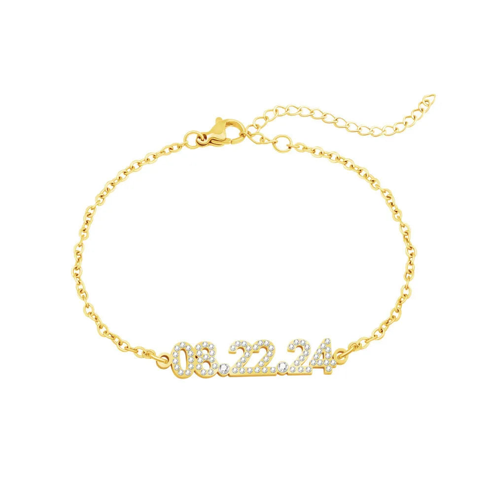 Stainless steel digital bracelet with diamond-set numbers on display, shown in a gold tone finish.