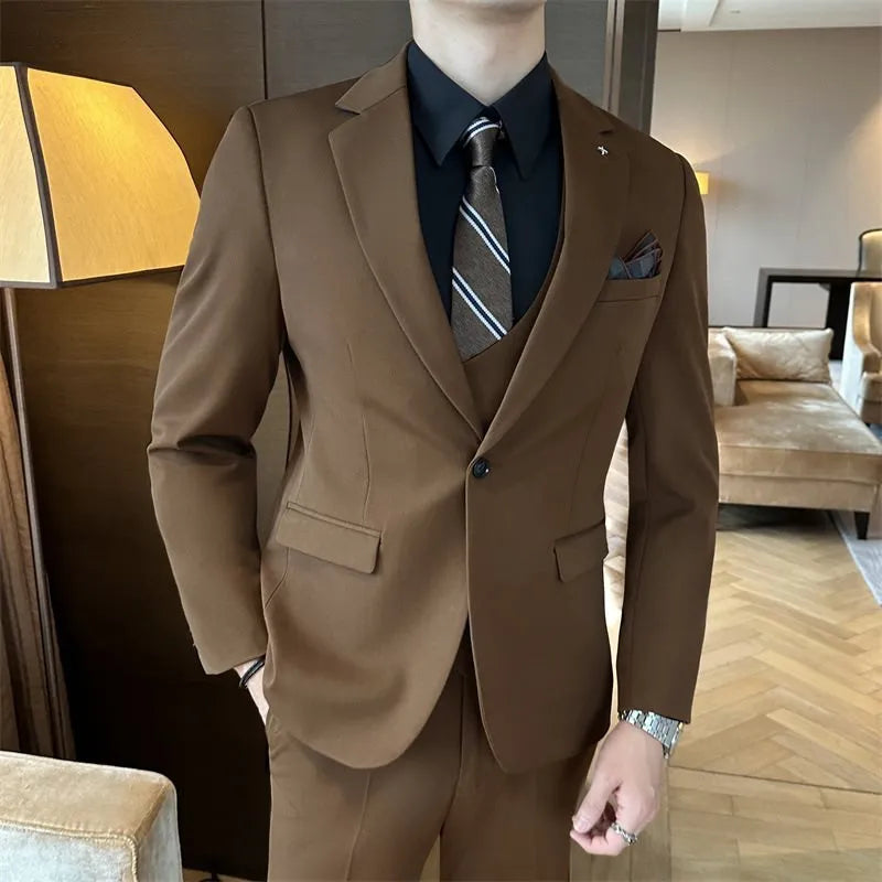 Men's slim fit business formal jacket and trousers in a dark green chemical fibre blend fabric.