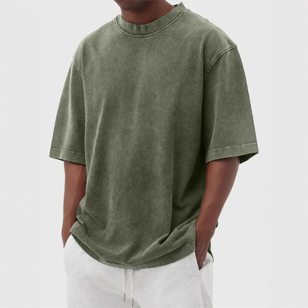 Men's distressed stone wash pullover T-shirt in loose fit with half sleeves available in multiple solid colours