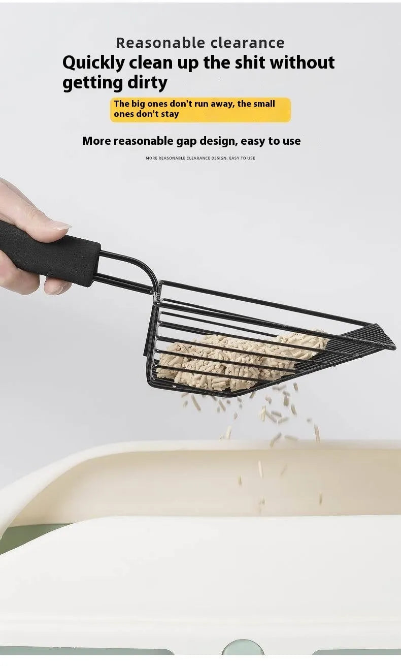 Black metal cat litter scoop with narrow tines for sifting clumping litter.