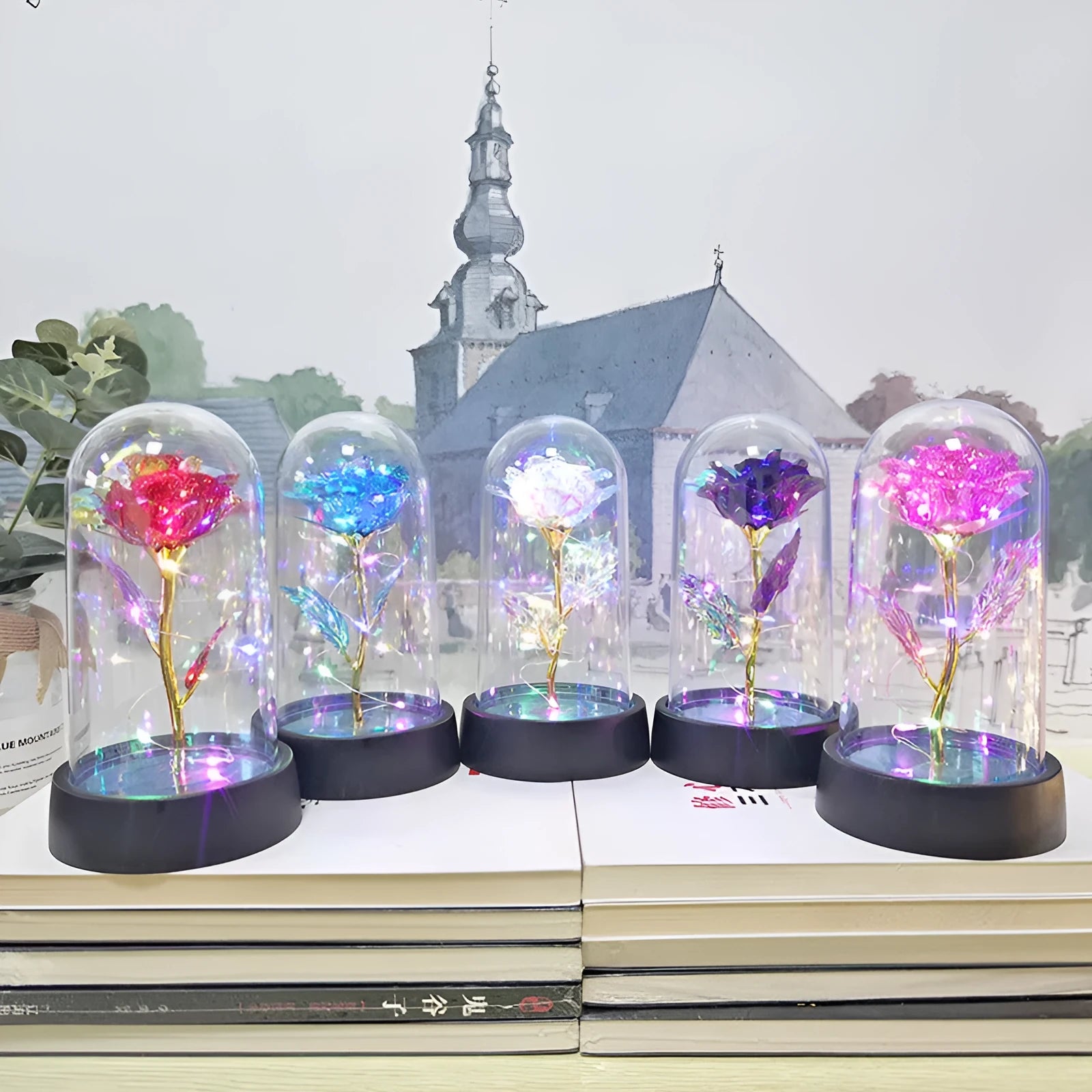 Small plastic night lamp with glass cover and flower decoration on black base