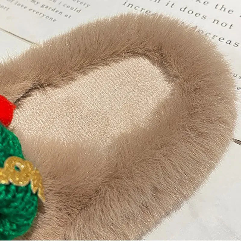 Women's black Christmas hat design faux plush slippers with a hairy texture and rubber sole.