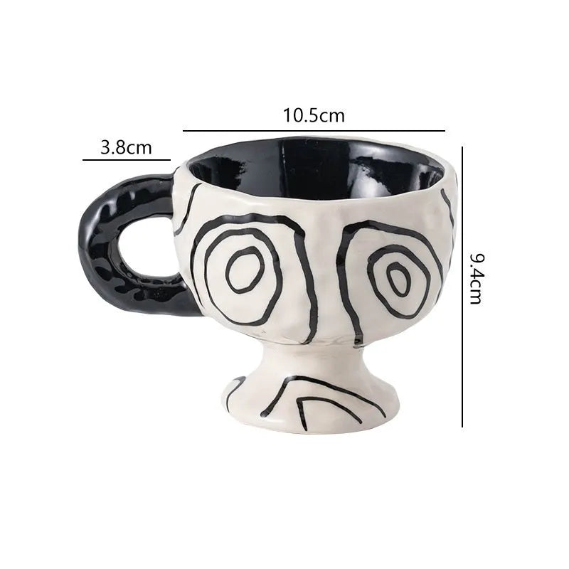 Handmade ceramic mug with irregular shape in solid colour