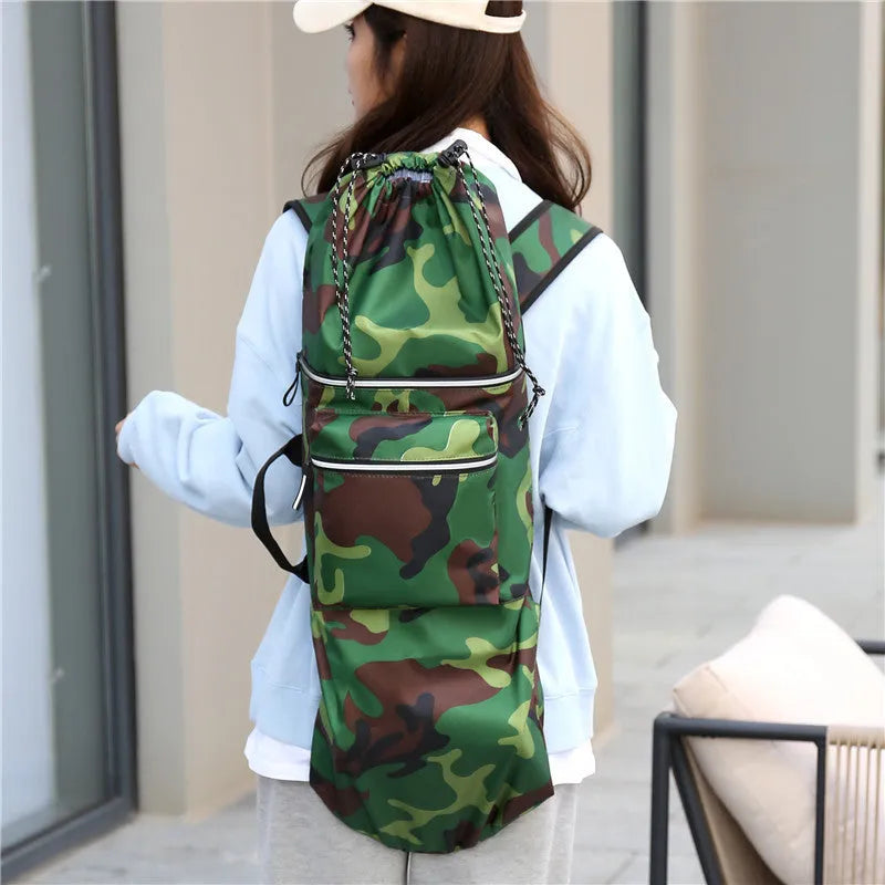Lightweight waterproof nylon skateboard bag in camouflage green, showing large main compartment.