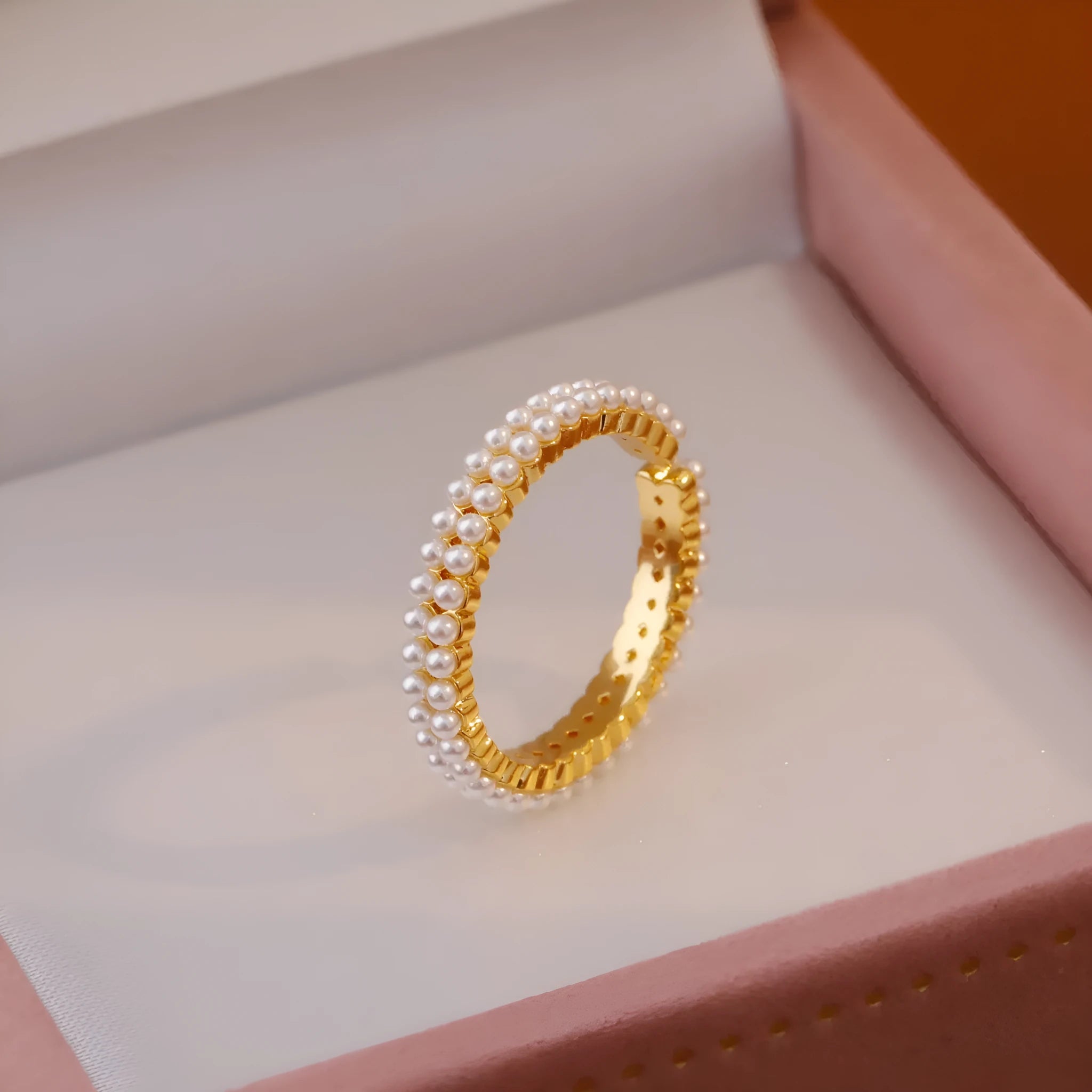 Geometric open mouth ring with electroplated gold finish and round pearl elements