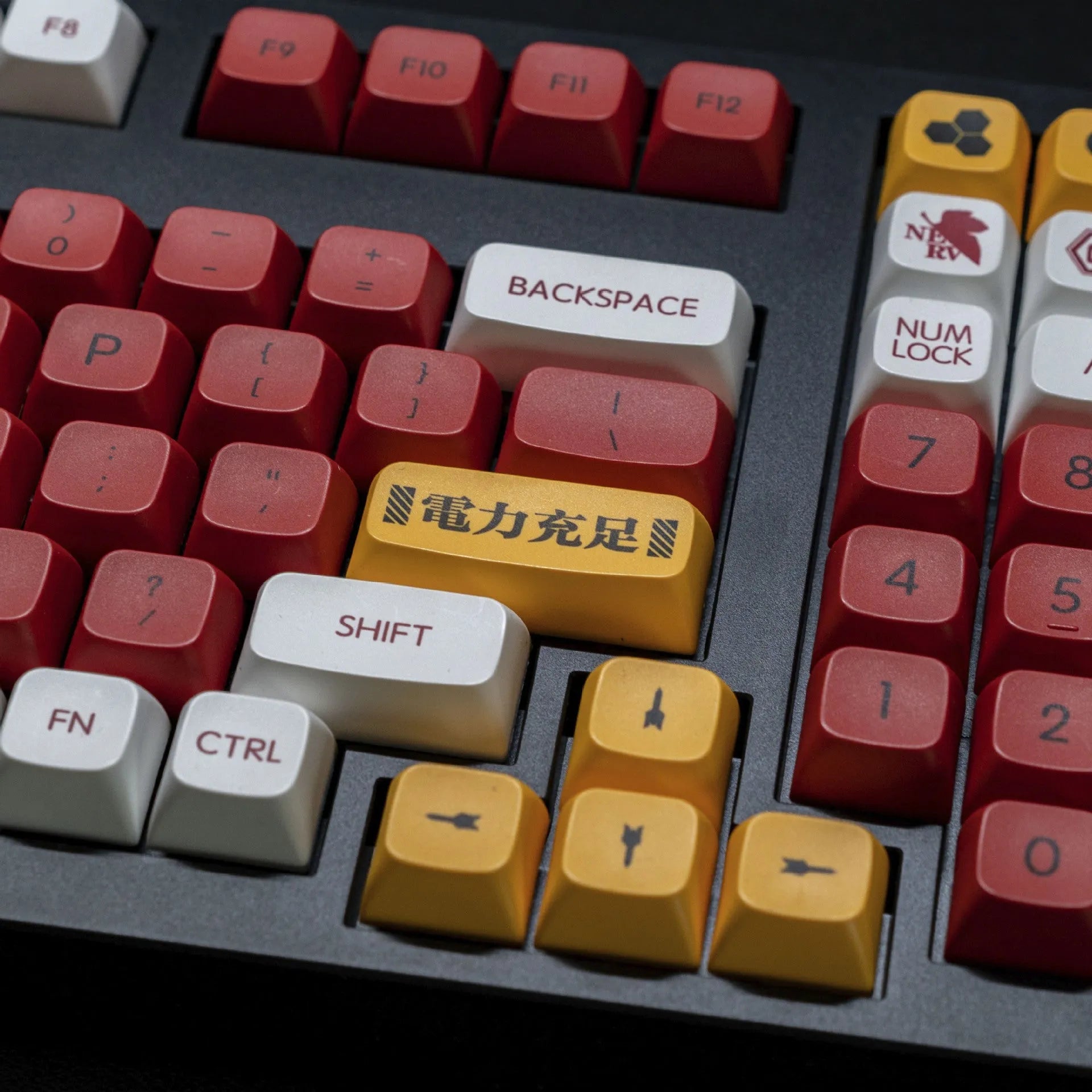 Set of 138 PBT sublimation printed key caps for a mechanical keyboard on a desk.