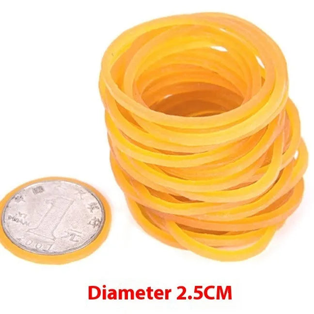 Assortment of bright yellow rubber bands in various sizes from a 500g pack.