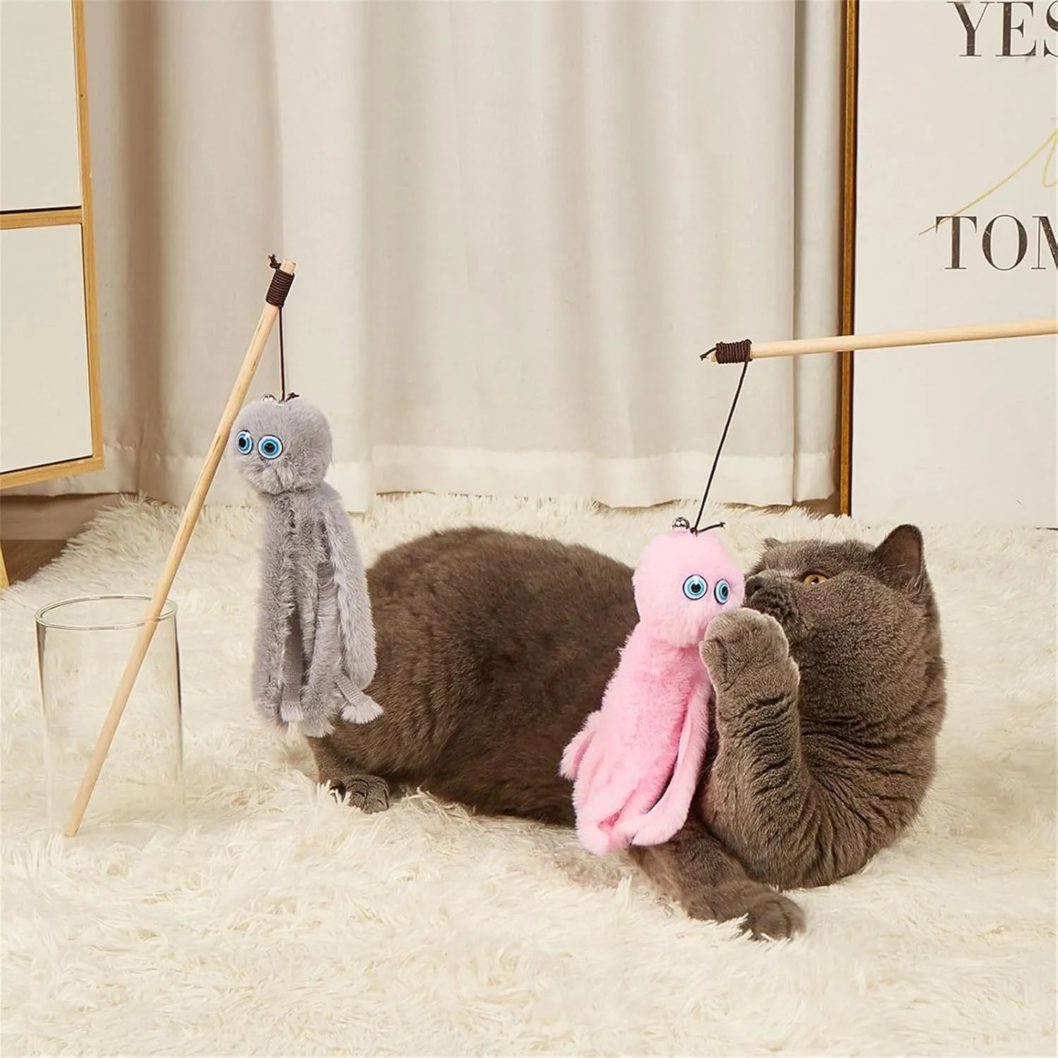 Octopus-themed cat toy with long stick handle and moving eyes for indoor play with kittens