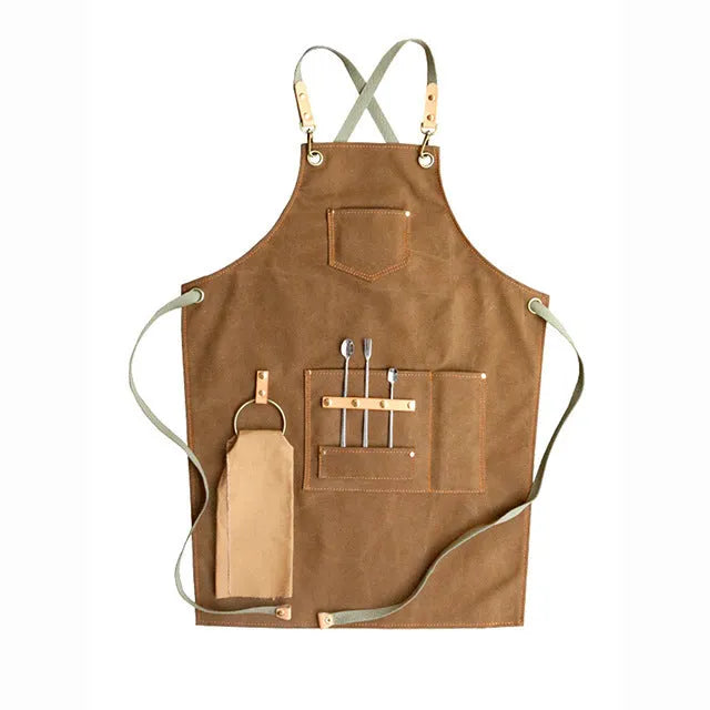 Canvas apron with cross back straps in camel colour for cafe and baking workwear