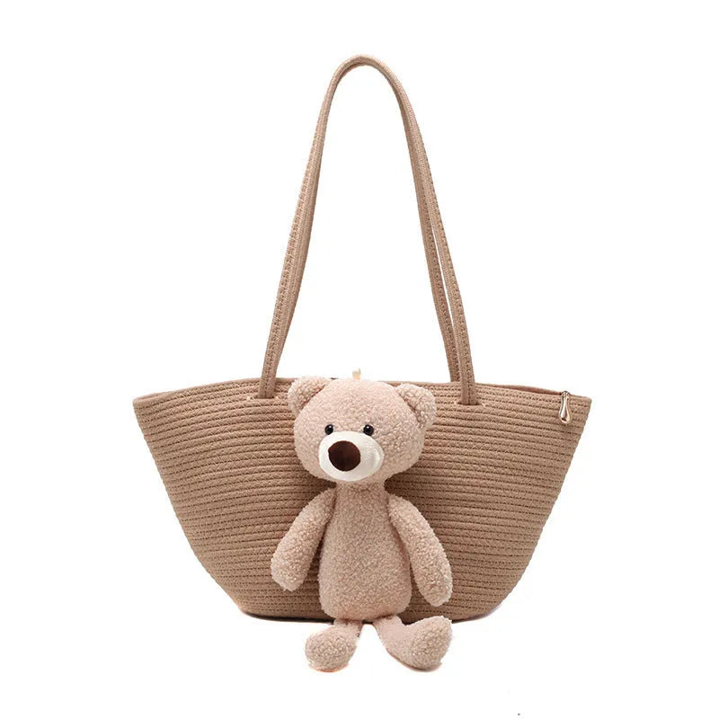 Cotton and linen woven shoulder bag with dumpling shape and double straps in multiple colours