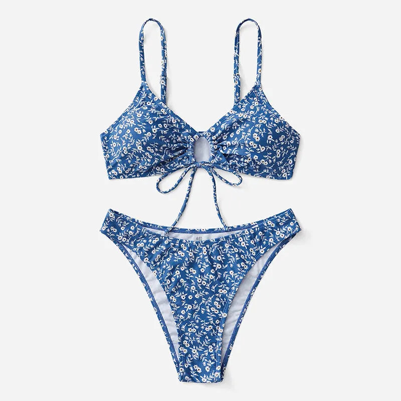 Blue polyester three-piece swimsuit set with separate top and shorts