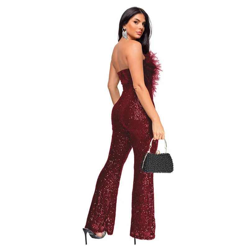 Women's sleeveless backless jumpsuit with flared legs and sequin collar in a selection of colours.