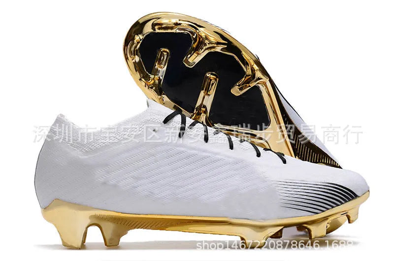 Men's low-top knitted football shoes with white/blue colourway, showing FG studs on rubber outsole and lace-up front.