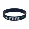 Palestine flag silicone wristband set with geometric design, including black and white plain bands