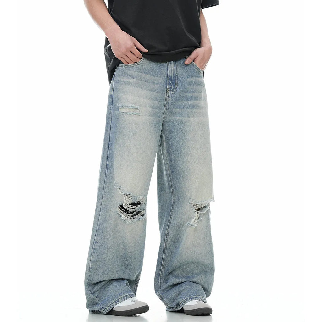 Blue men's straight-leg jeans with ripped detailing and an adjustable waistband.