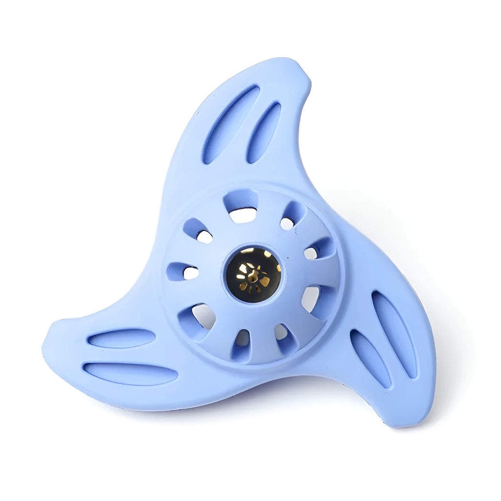 Blue bite-resistant boomerang-shaped dog toy with molar texture on a white background.