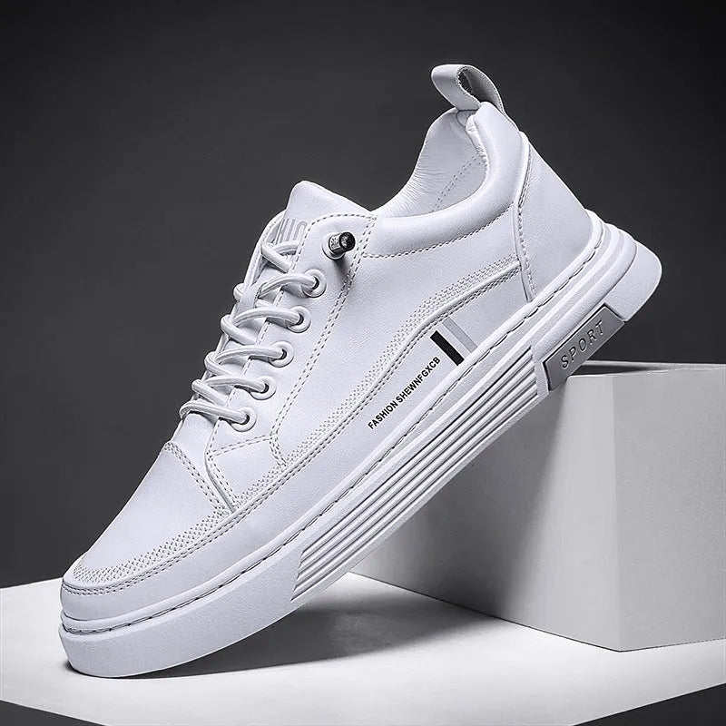 Men's white and black low-top skate shoes with elastic band and microfiber upper.