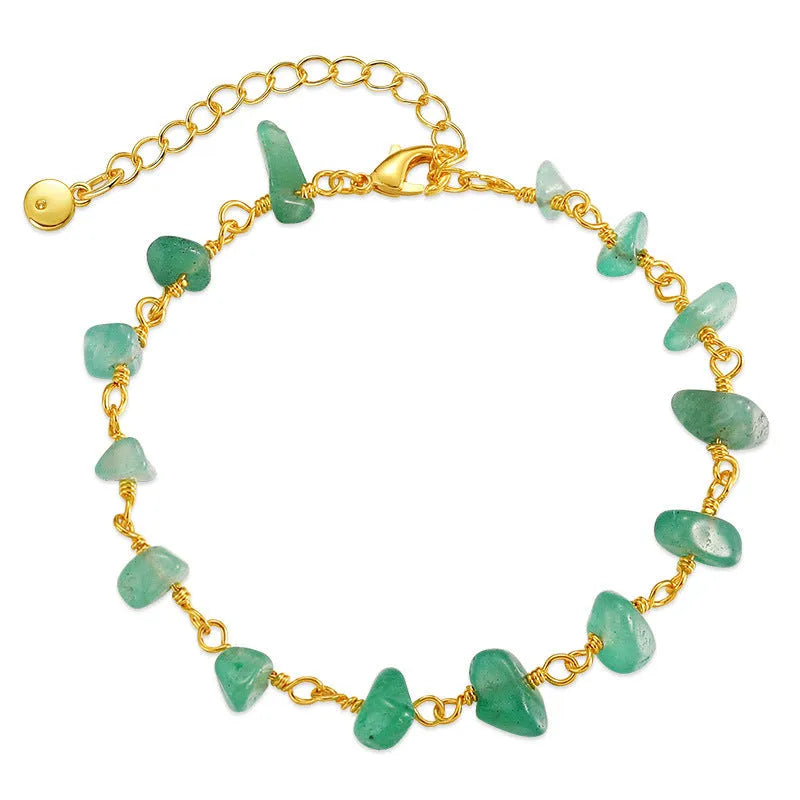 Geometric women's bracelet with irregular natural gravel turquoise stones and crystal accents on 18K copper