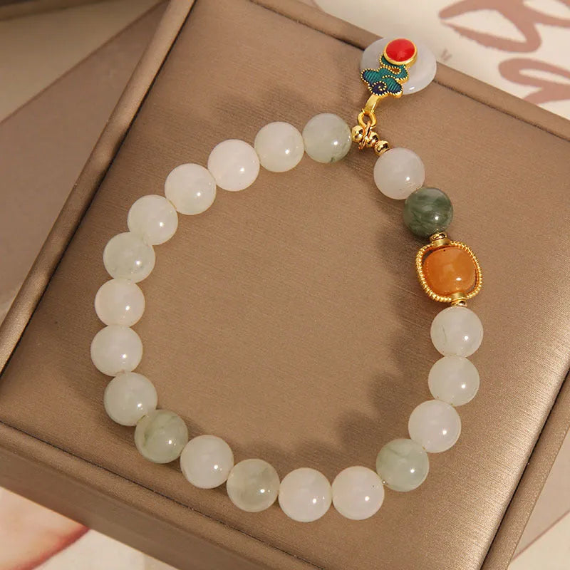 Women's ice jade crystal bracelet with Xiangyun peace buckle and pearl decorative elements