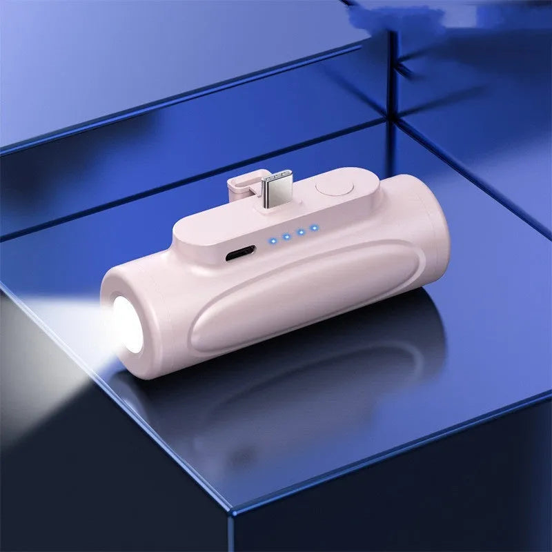 Black creative power bank with LED flashlight showing Type-C port and compact 83x27x41mm dimensions