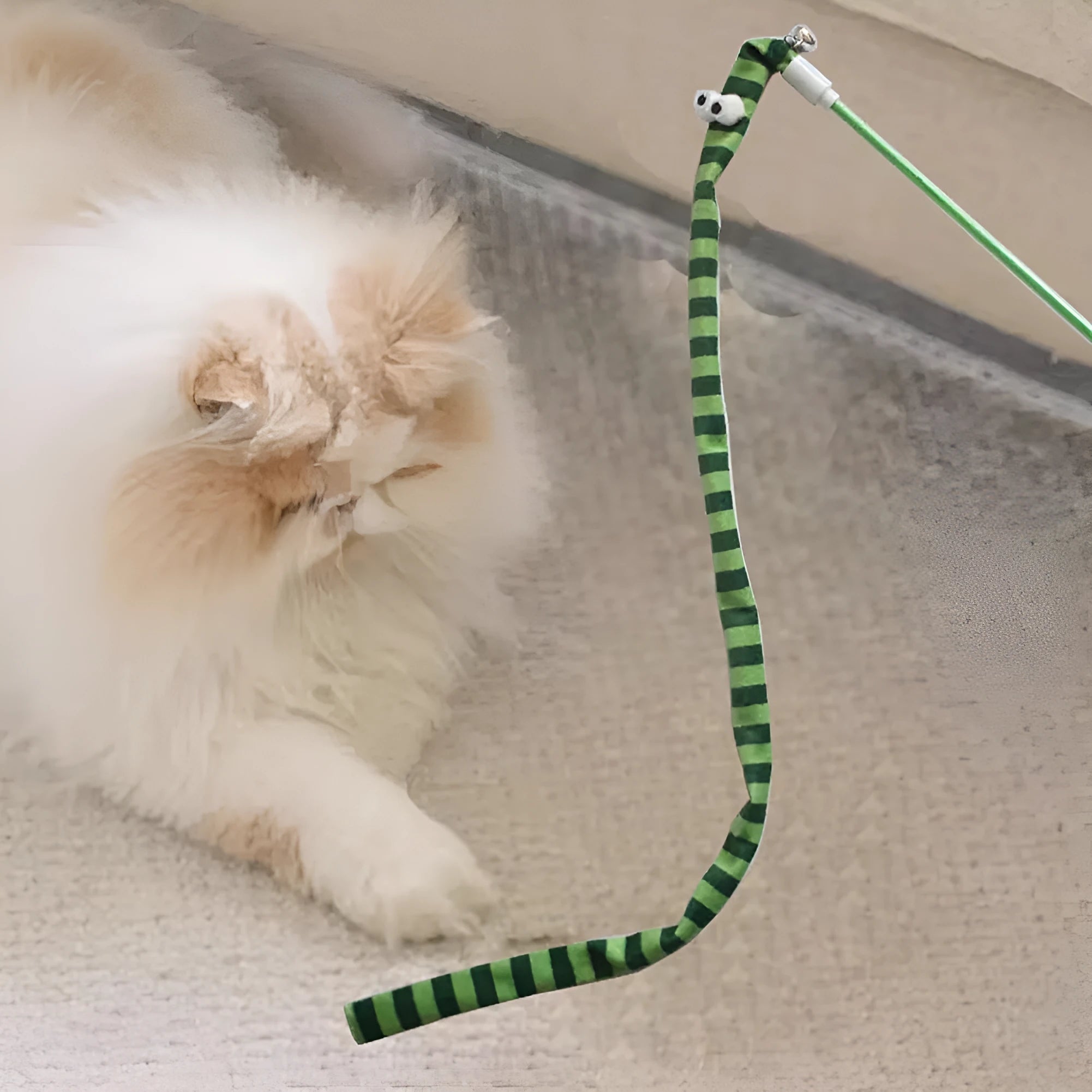 Cat wand toy with polycarbonate pole and plush strip in bright colours for interactive play