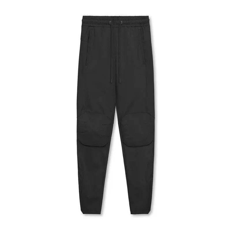 Men's loose grey quick-dry fitness trousers with ankle-tied cuffs for running and gym workouts
