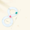 Blue and white circular cat turntable track with four spinning balls and teasing stick for feline play