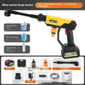 Green cordless high-pressure water gun with multiple nozzle attachments and extension rod on a patio.