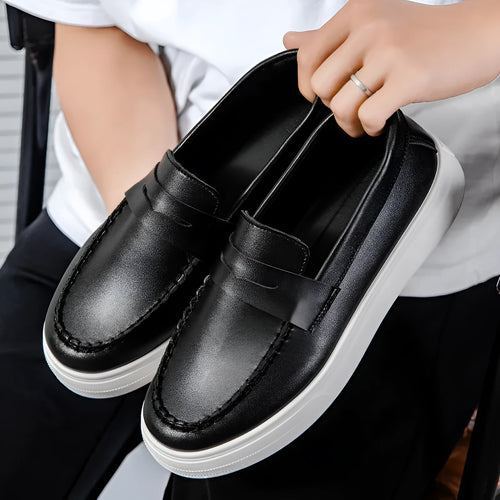 Men's white PU leather slip-on loafers with round toe on a solid background.